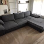 This is a photo of a grey L shape sofa that has been professionally steam cleaned, also the beige carpets have been steam cleaned too works carried out by Clerkenwell Carpet Cleaning